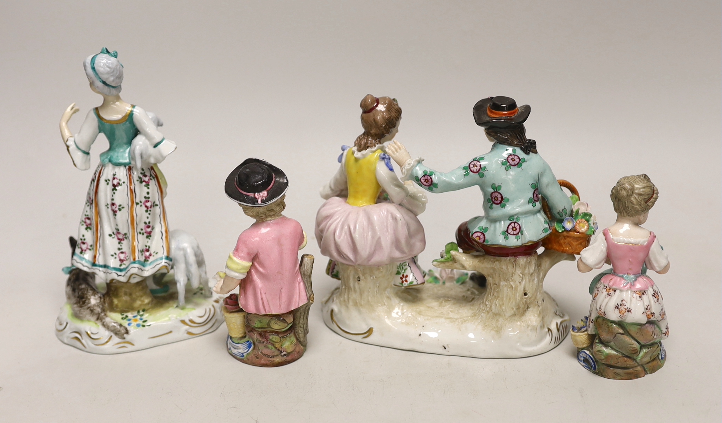 Four German porcelain figures and figural groups, including Sitzendorf, tallest 16.5cm